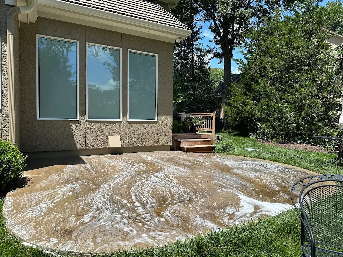 Backyard patio before cleaning